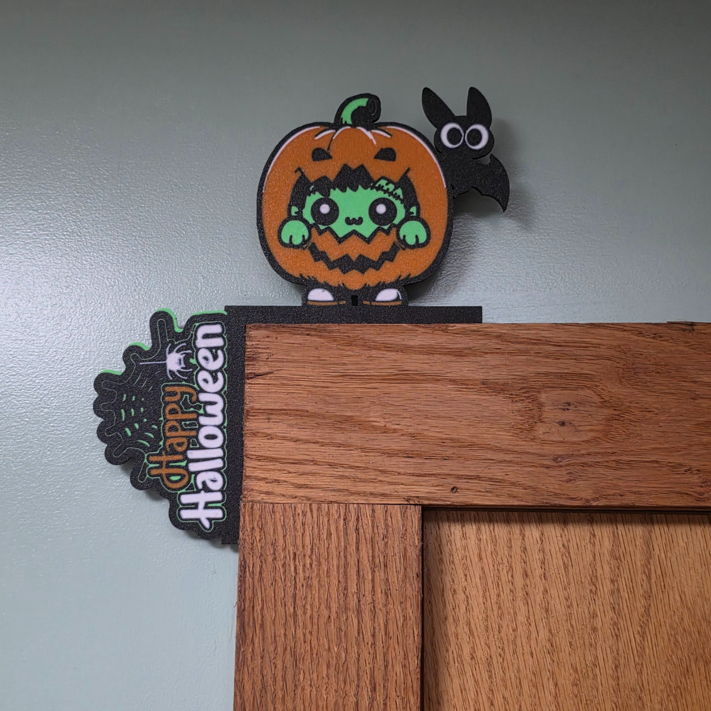 Baby Frankenstein in Pumpkin Happy Halloween Door Corner