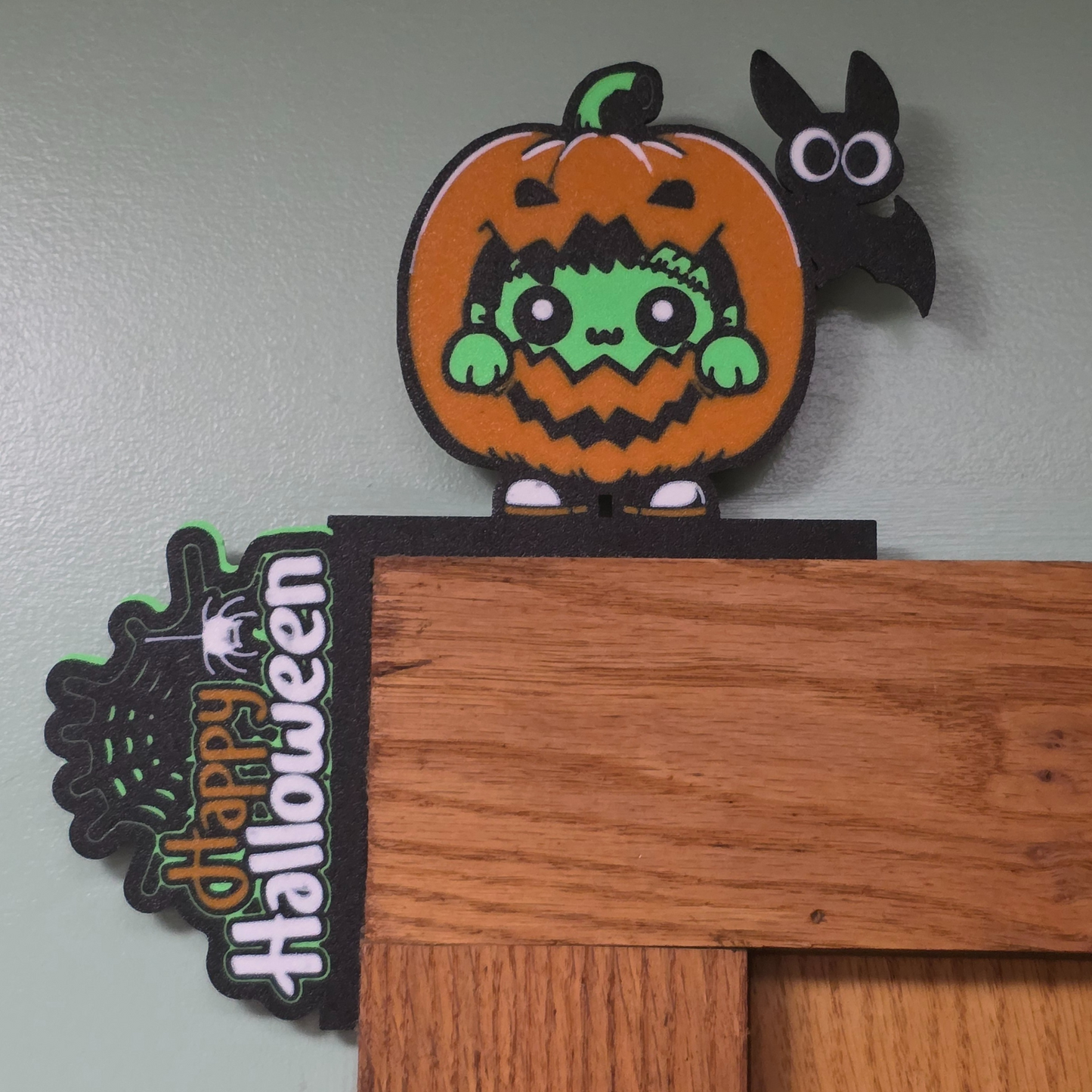 Baby Frankenstein in Pumpkin Happy Halloween Door Corner